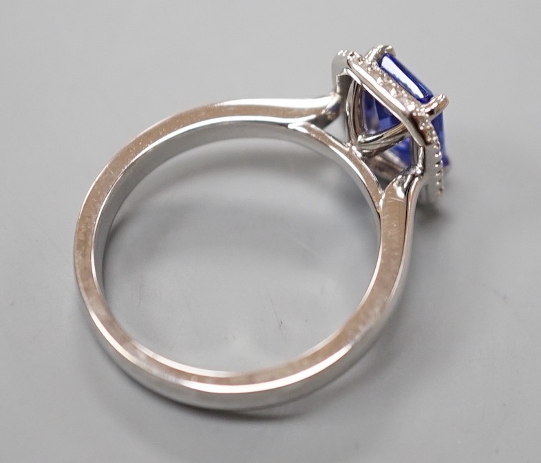 A modern 18k white metal, tanzanite and diamond set rectangular cluster dress ring, size M, gross weight 5 grams